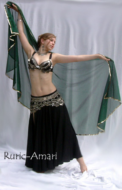 Ruric-Amari in American Oriental coin belt and bra