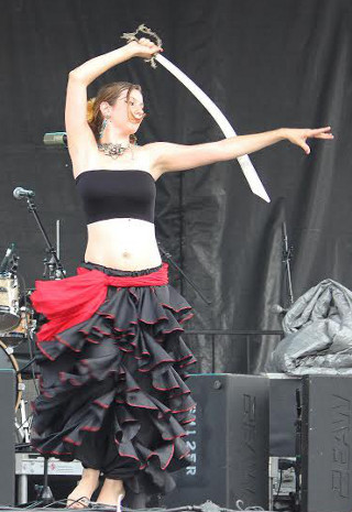 Ruric-Amari on stage at Worldfest 2014